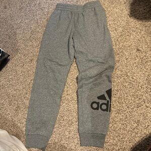 Adidas sweatpants.